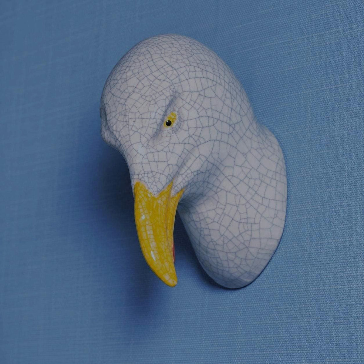 Close-up of handmade ceramic Left-Leaning Seagull showing its sculpted details.