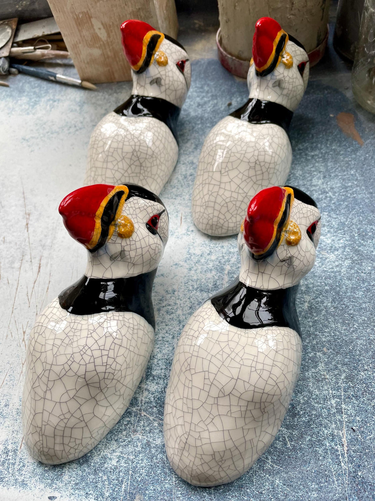 Close-up showing the sculpted details and glaze of the ceramic handmade Puffin.