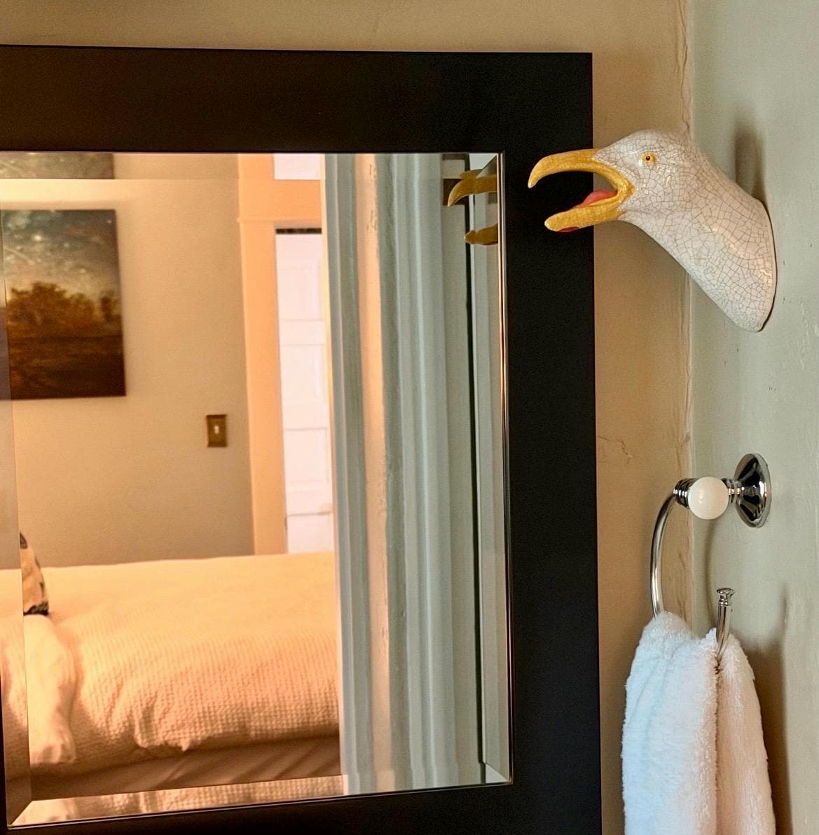 Handmade ceramic Squawking Seagull on a bathroom wall.