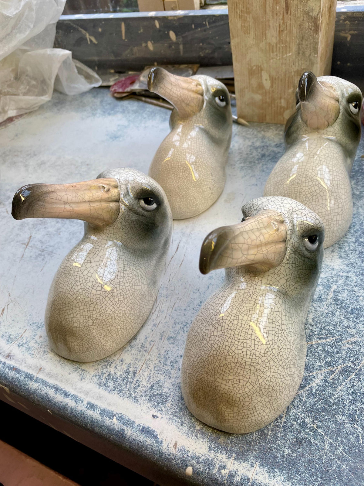 Side view of the handmade ceramic Albatross wall sculpture.