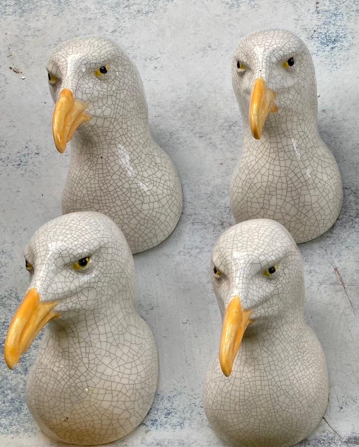 close up of handmade ceramic Seagull wall sculpture.